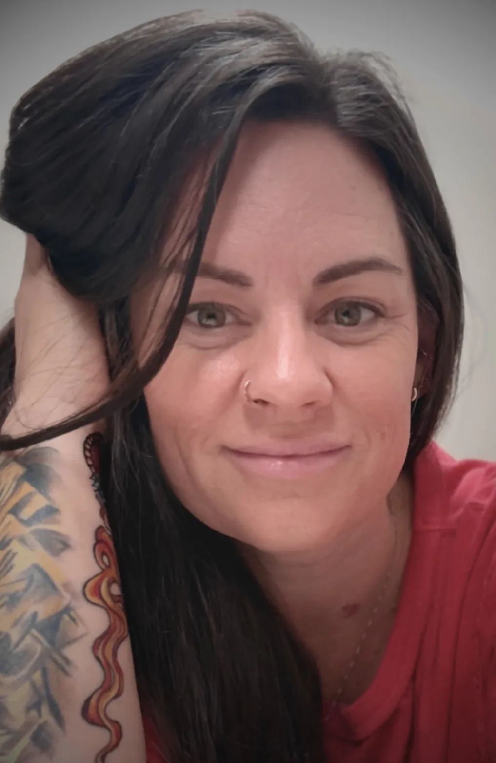 Kristen Lizotte wearing a red shirt